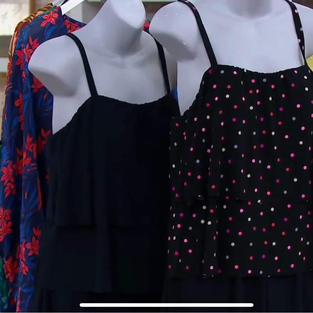 Black bottom with pink and lilac dots on top.